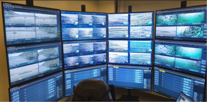Control room with many monitors monitoring fish shoals and environmental conditions in aquaculture facilities